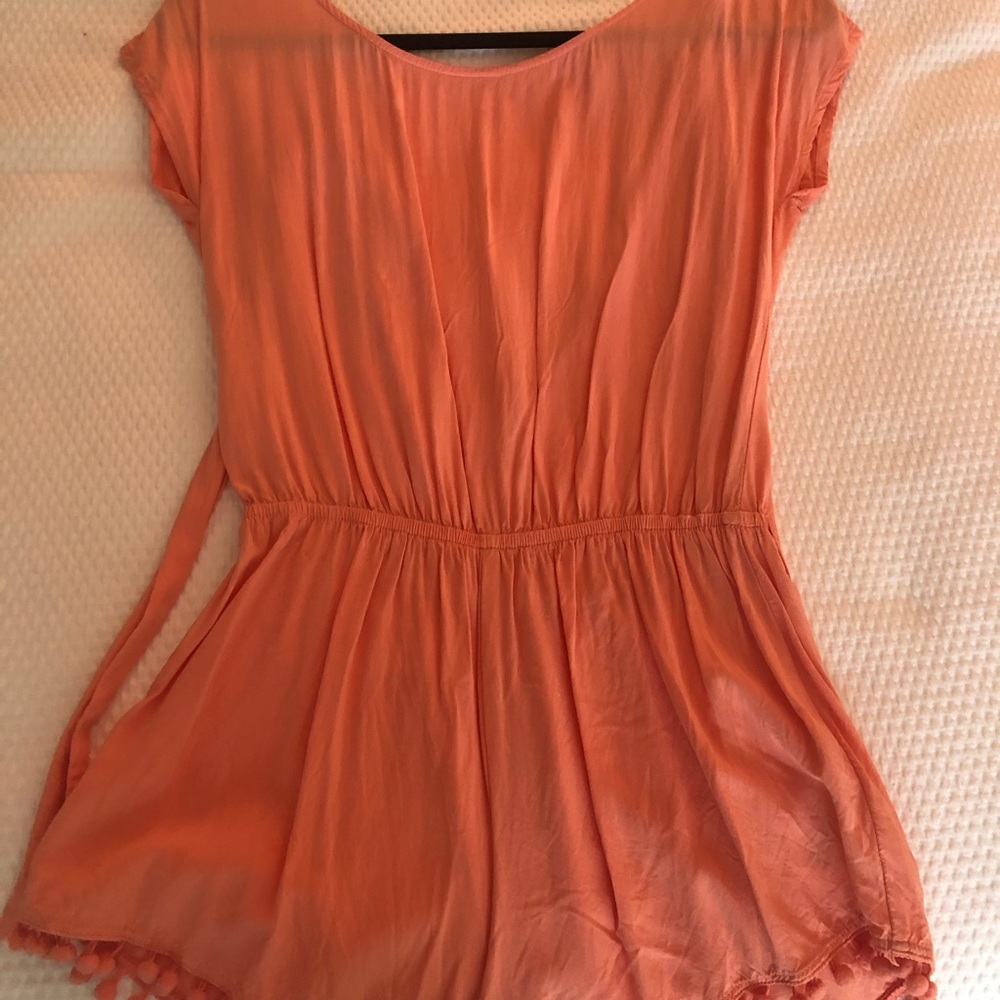 Orange Romper with Pom Poms